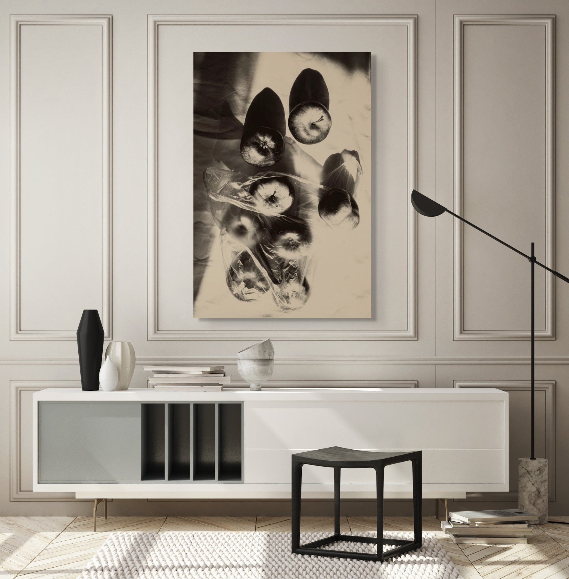 Modern interior with a framed black and white artwork on a wall above a console table.