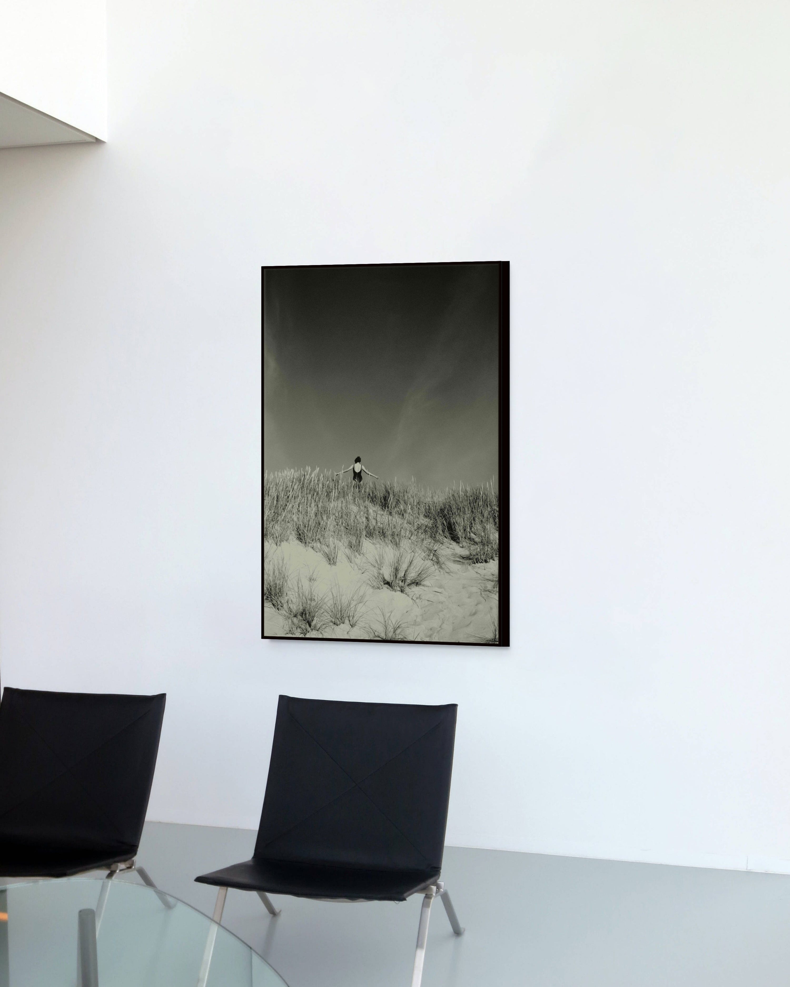 Framed fine art photograph Baltic Dunes by Jonė Reed, displayed in minimalist office interior