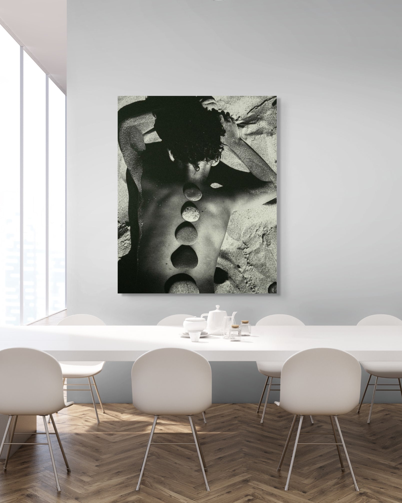 Framed black and white fine art print in dining room, Baltic Stones by Jonė Reed, ready to hang metal print