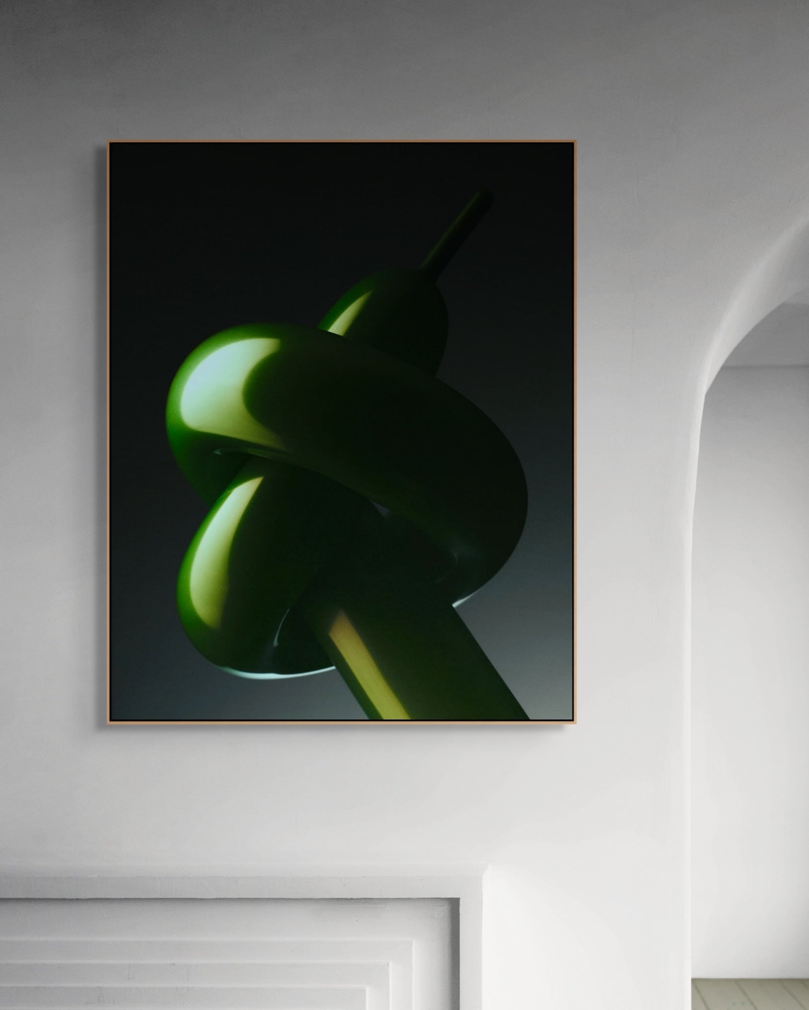 Framed abstract artwork with green and black colors on a wall.