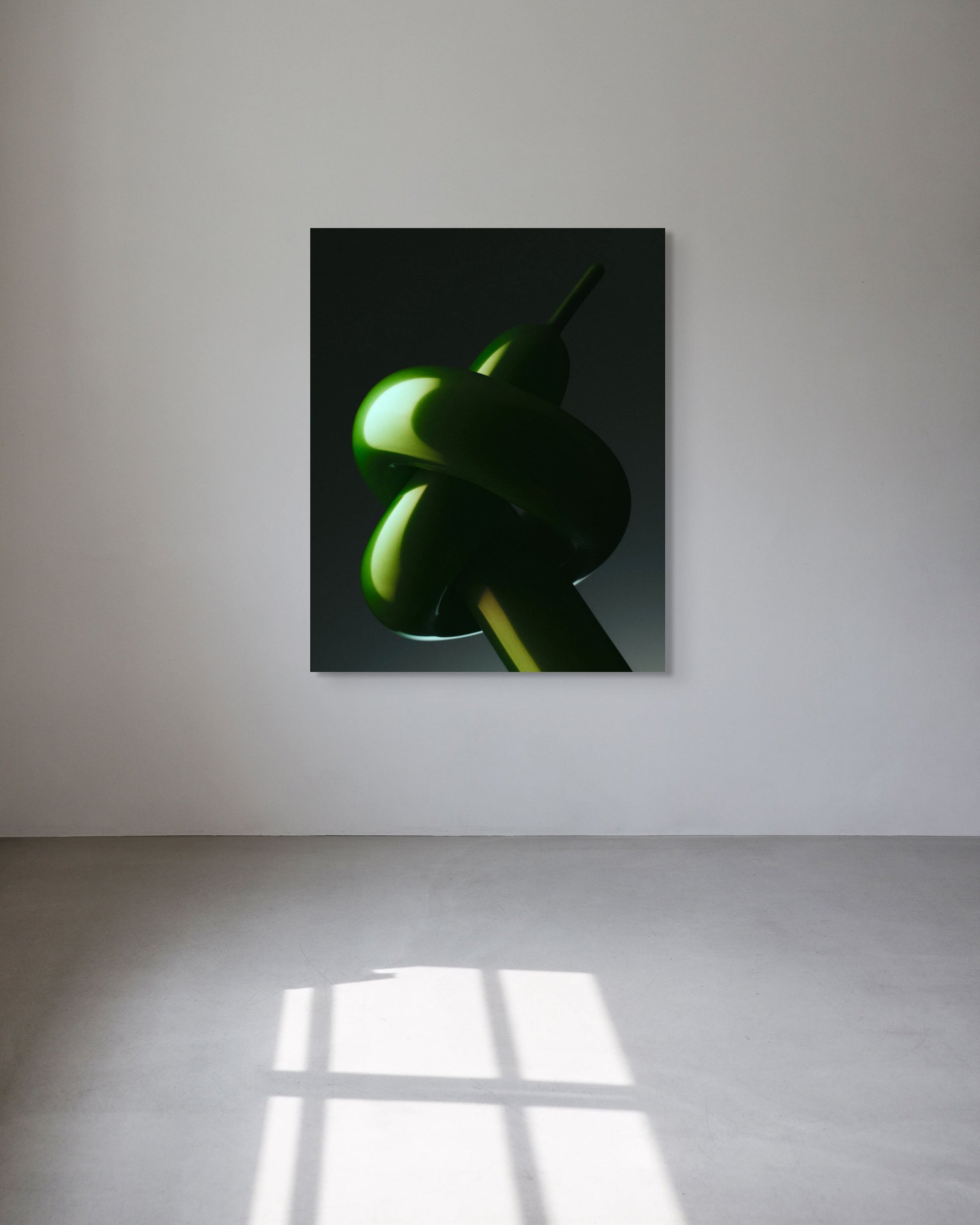 Abstract artwork of a green knot on a black background in a minimal white room.