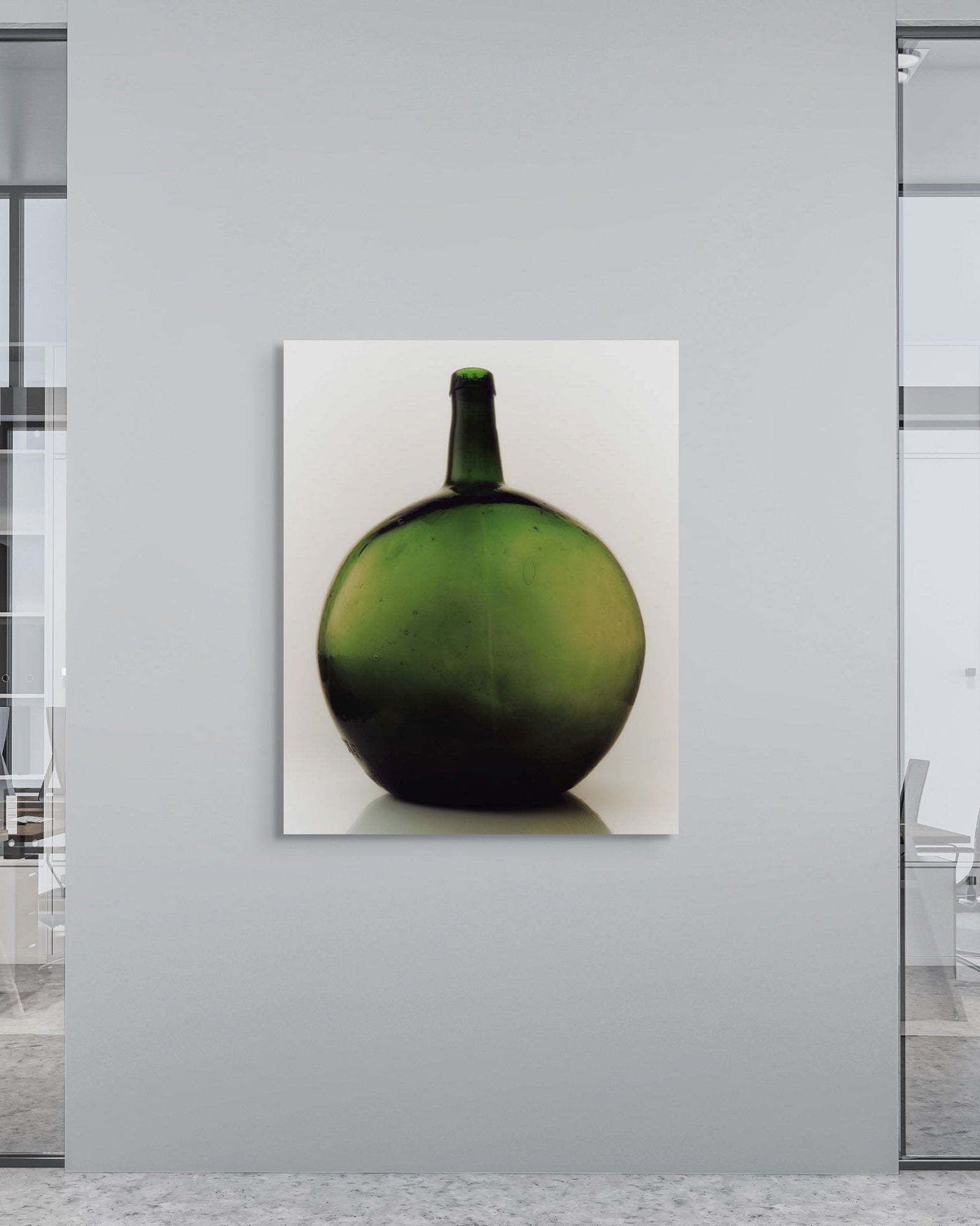Green vase painting on a wall in an office setting