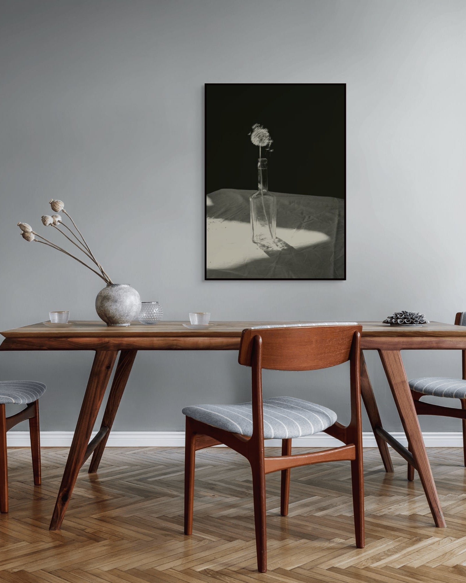 Dandelion by Jonė Reed – Limited edition fine art photograph, archival-quality print hanging in dining room with wooden table and chairs.