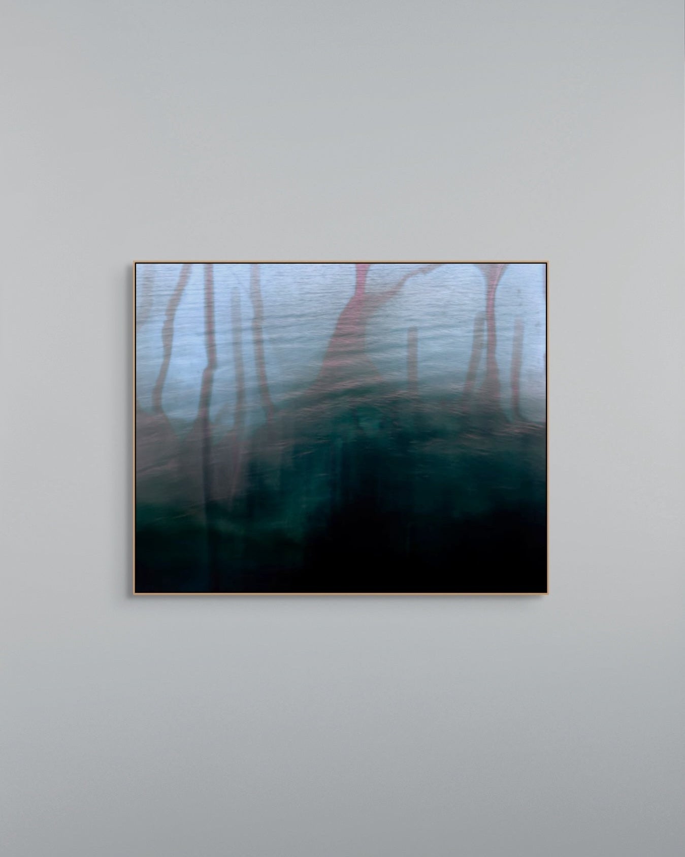 Framed artwork on a gray wall