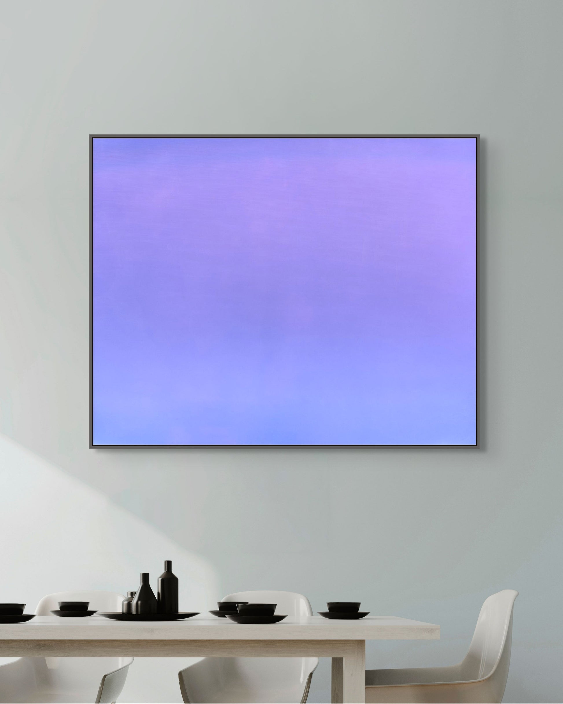 Modern dining room with a large abstract print on the wall displaying a gradient purple and blue color.
