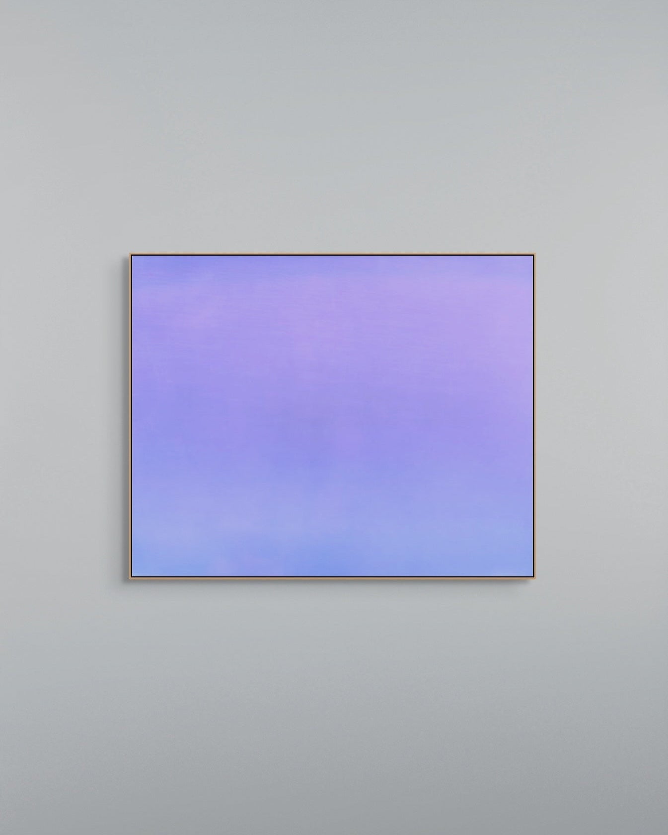 Square purple gradient metal print on a gray wall