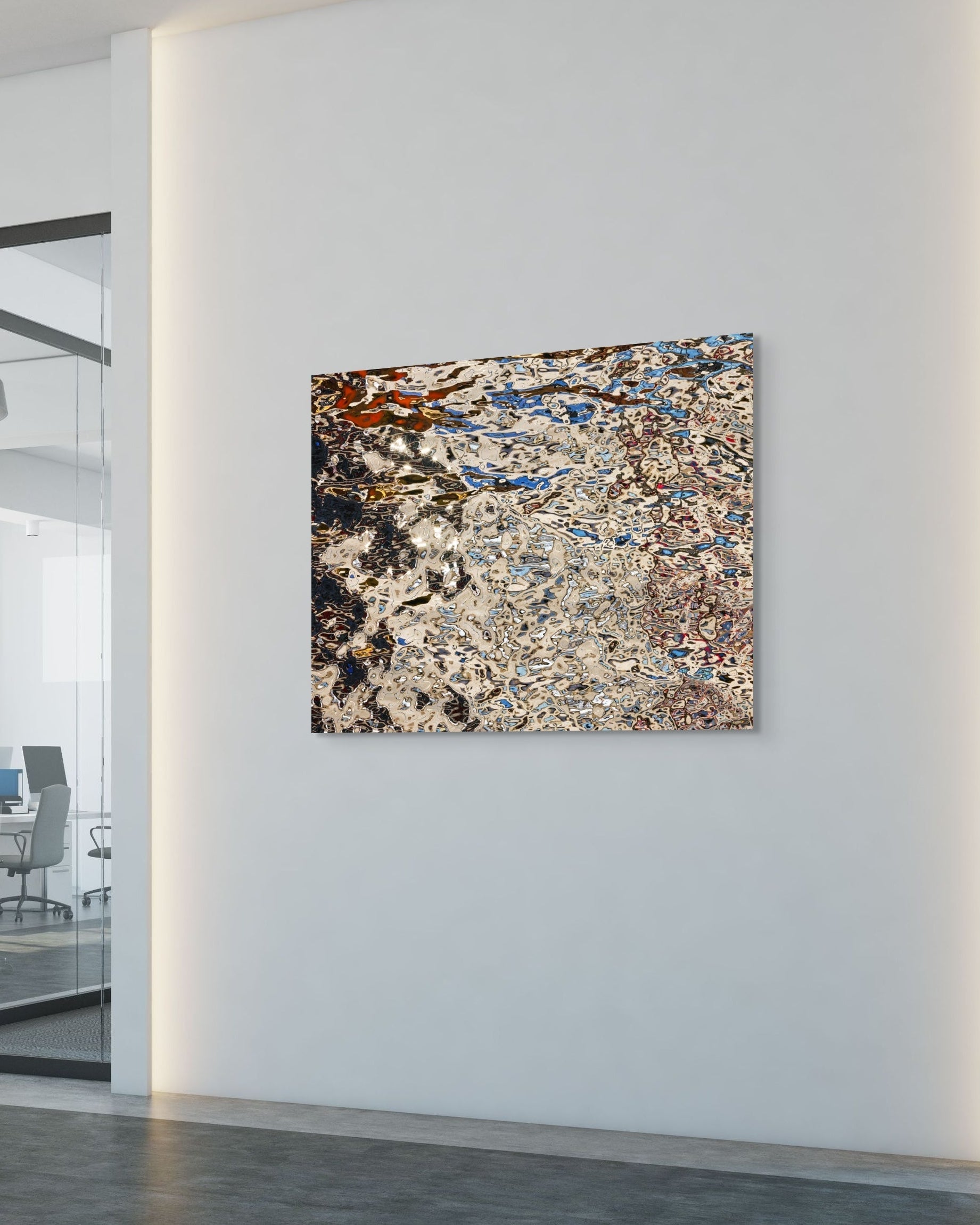 Abstract metal print on a wall in an office setting