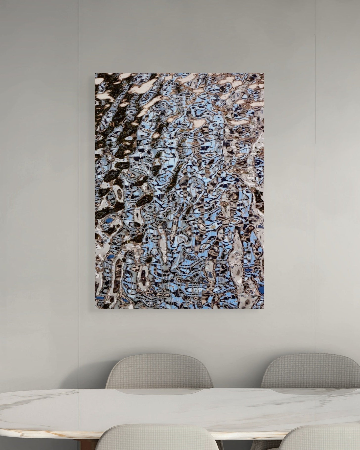 Abstract print on a wall above a table in a modern room