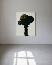 Metal print of a cactus on a white wall