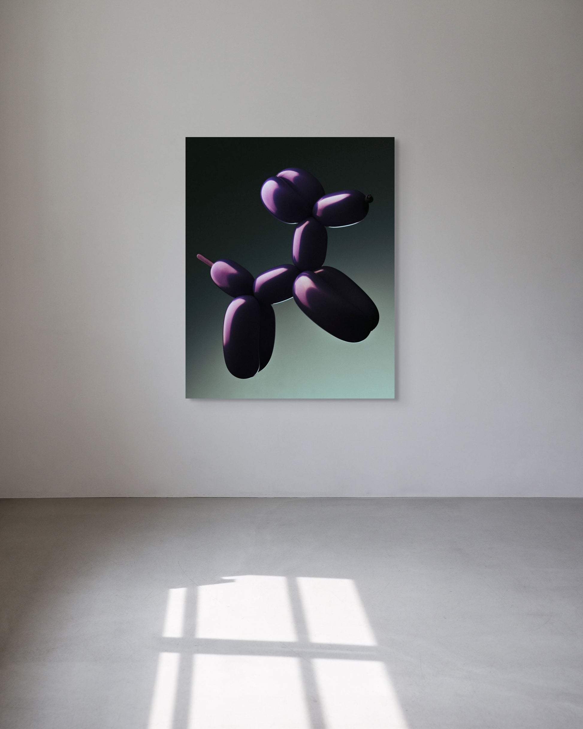 Abstract art piece of a balloon animal on a white wall