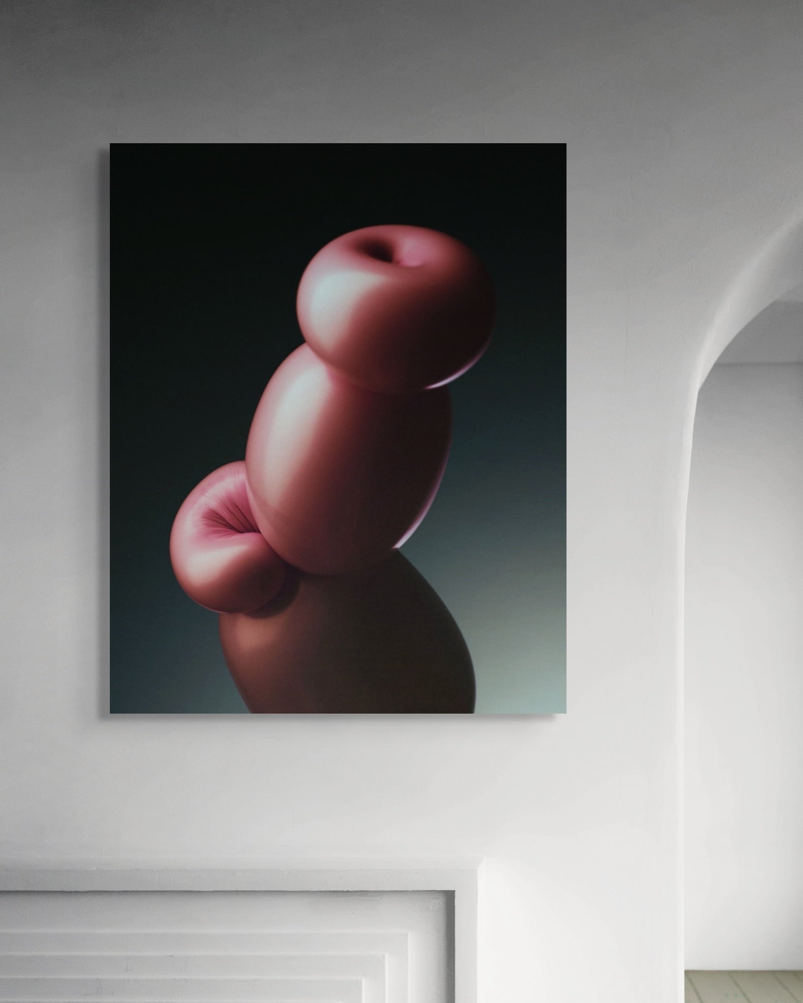 Abstract art piece of stacked red shapes on a dark background in a modern room.