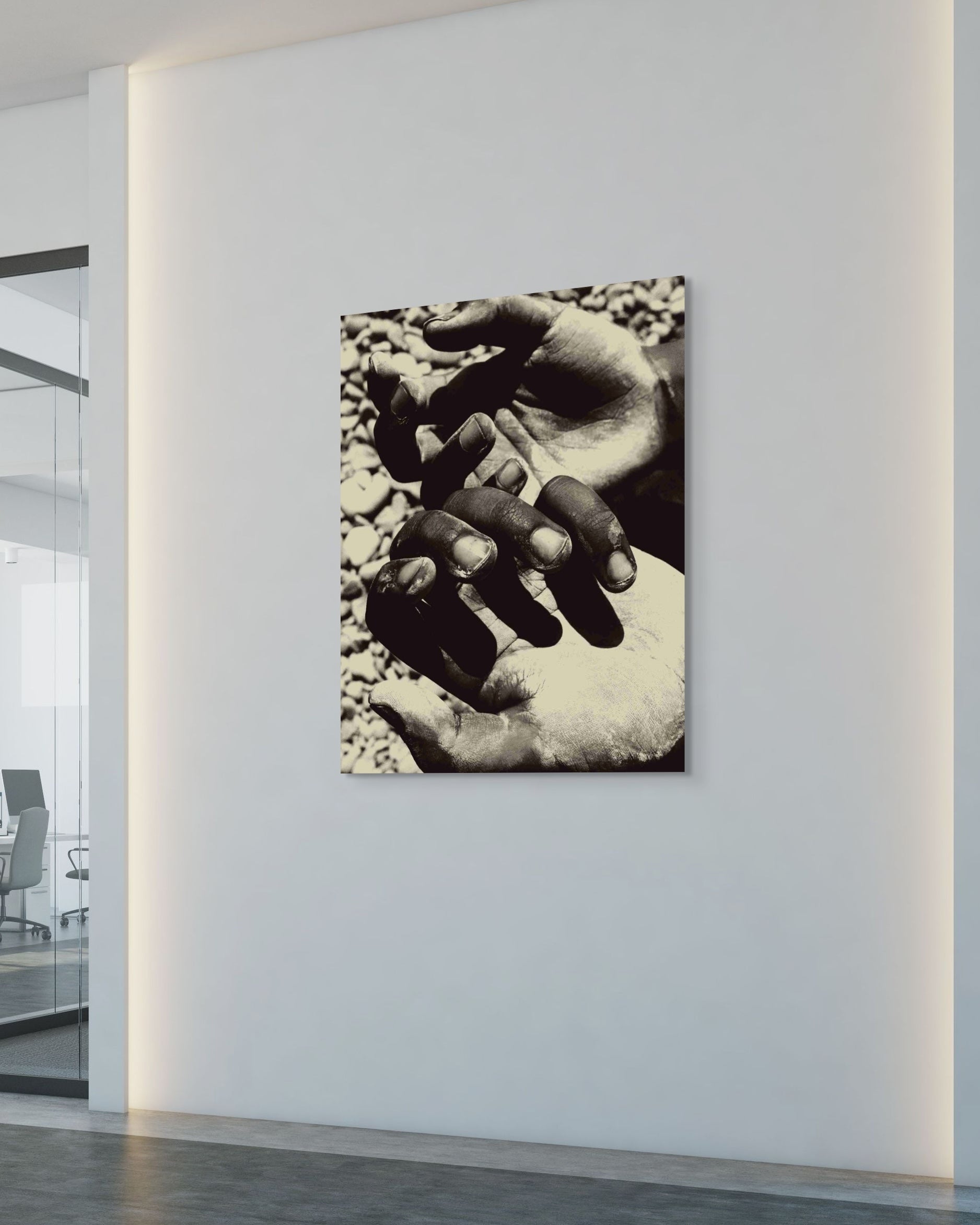 Black and white metal prints of hand in an office setting