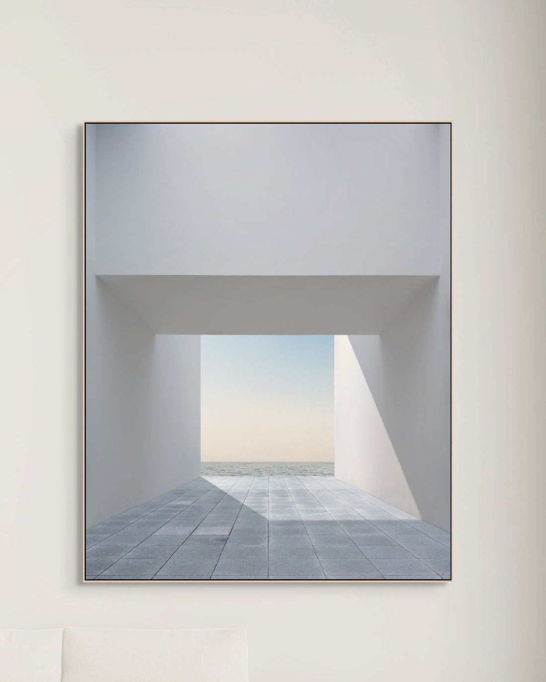 Framed abstract artwork on a white wall