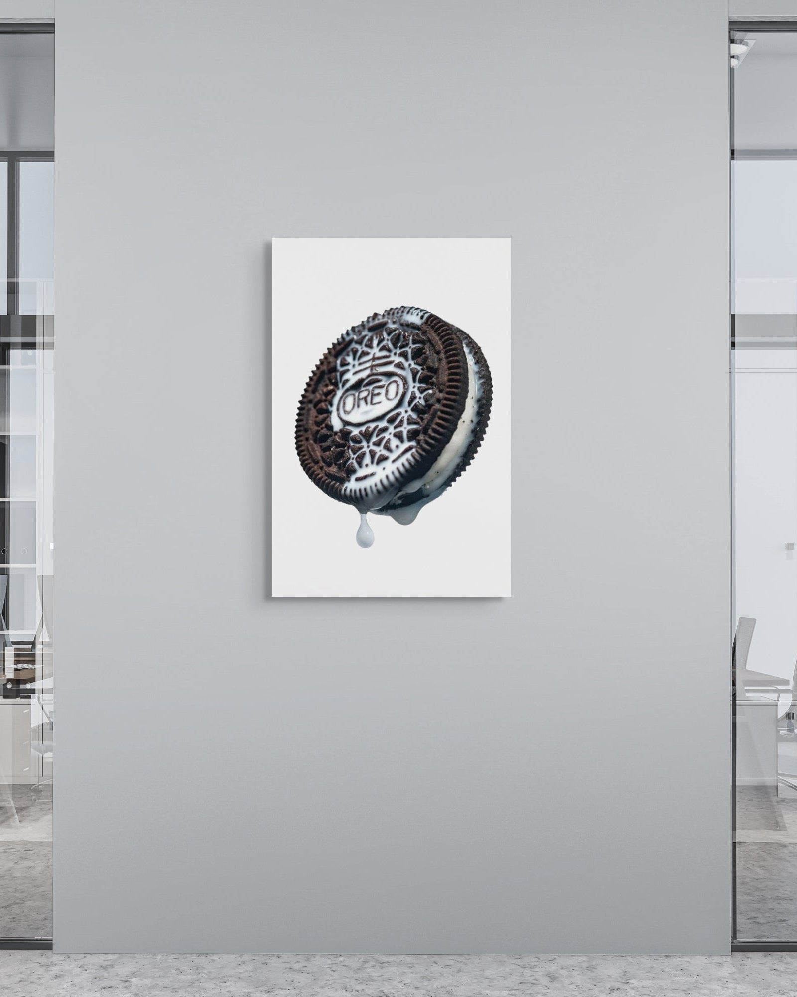 Modern office interior with a decorative wall piece featuring a black and white design.