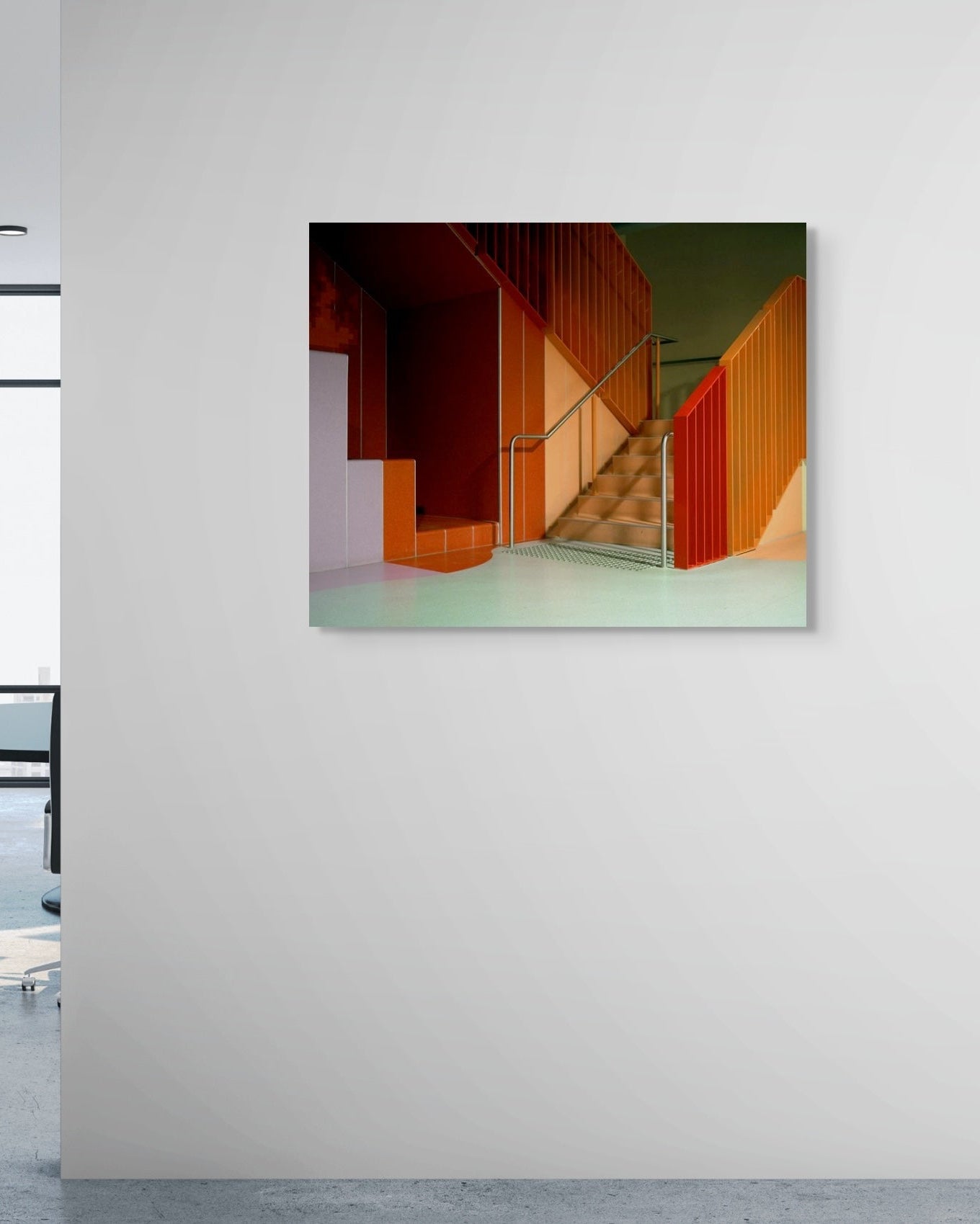 Abstract art piece on a wall in an office setting