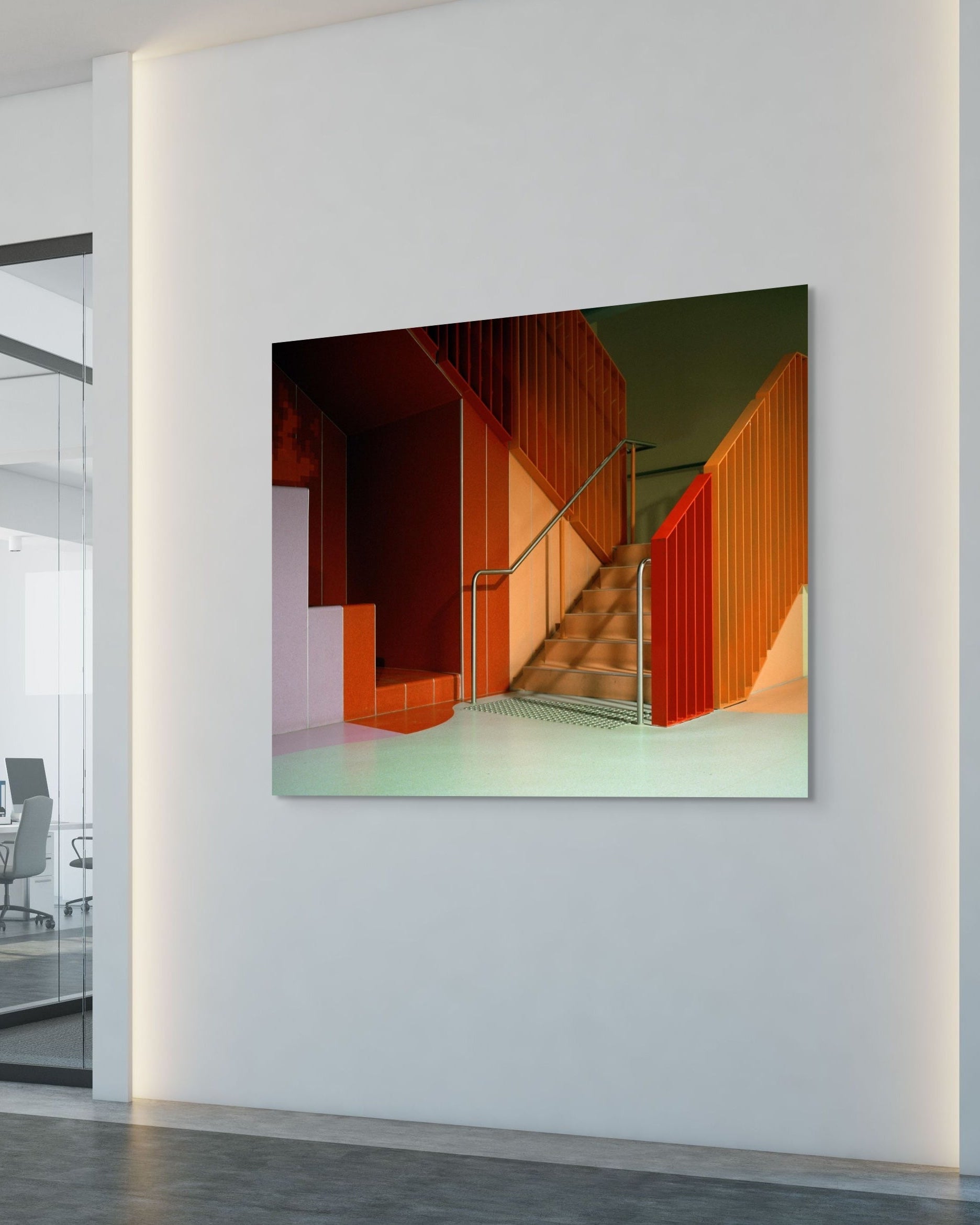 Modern interior with a large abstract metal print on a white wall