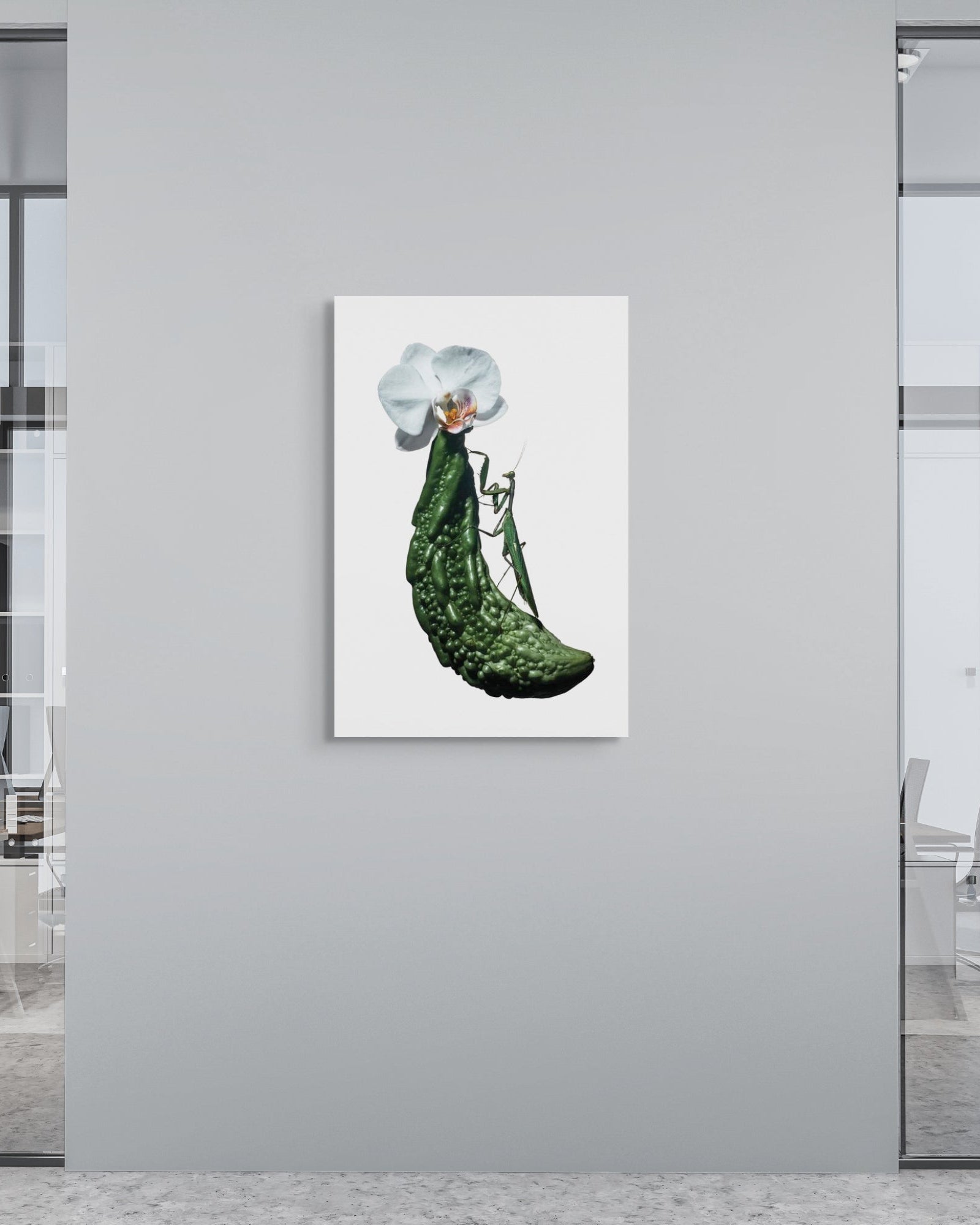 Modern office interior with a metal wall piece featuring a praying mantis.