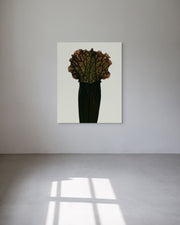 Artistic depiction of a flower on a white wall