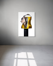 Abstract art piece on a white wall with a gray floor