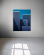 Abstract blue metal print on a white wall