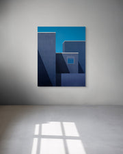 Architectural blue metal print on a gray wall