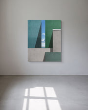 Architectural abstract metal wall art in a minimalist gallery space with soft natural light and a concrete floor.