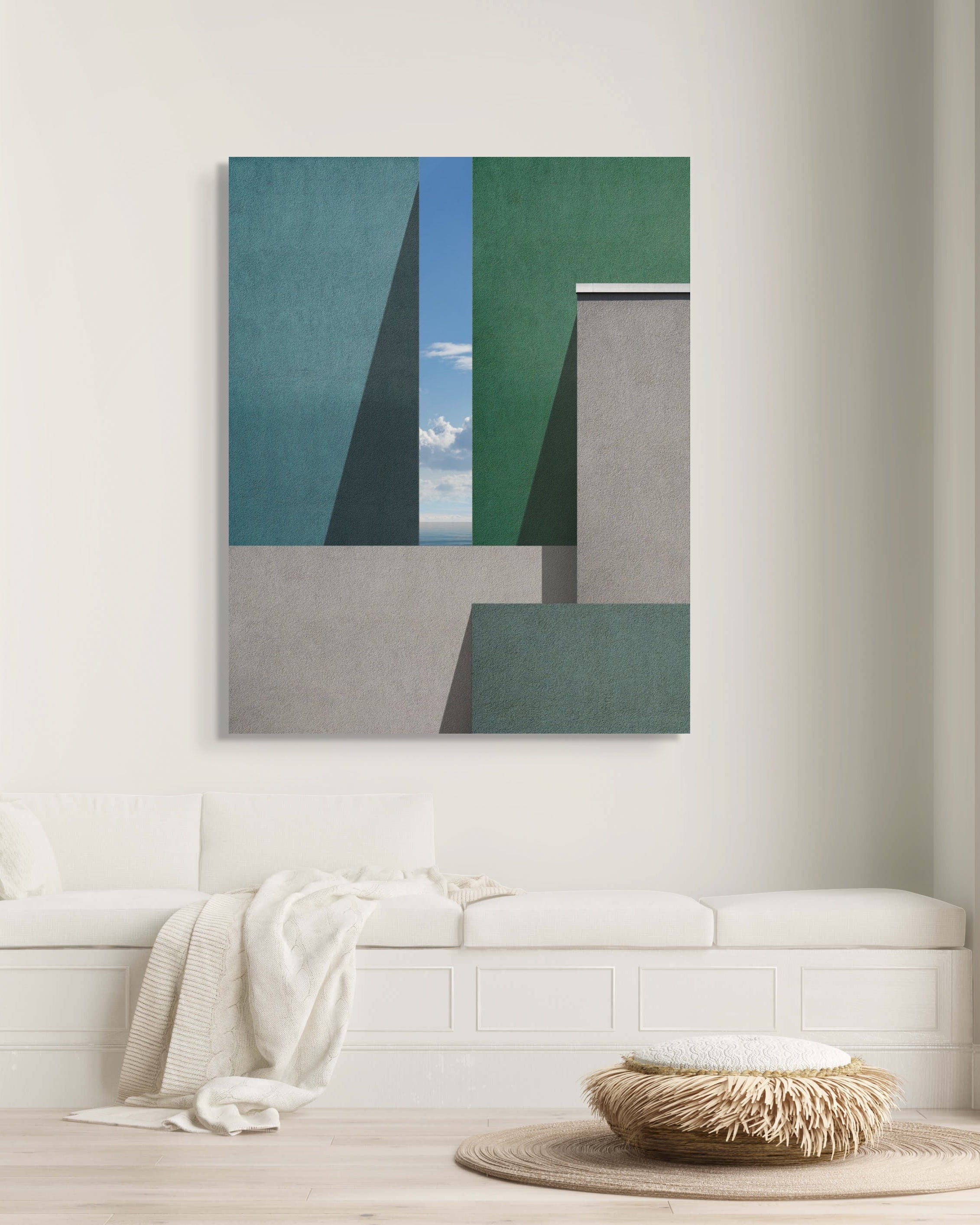 Architectural abstract metal print in a light, contemporary living space with neutral furnishings and natural textures.